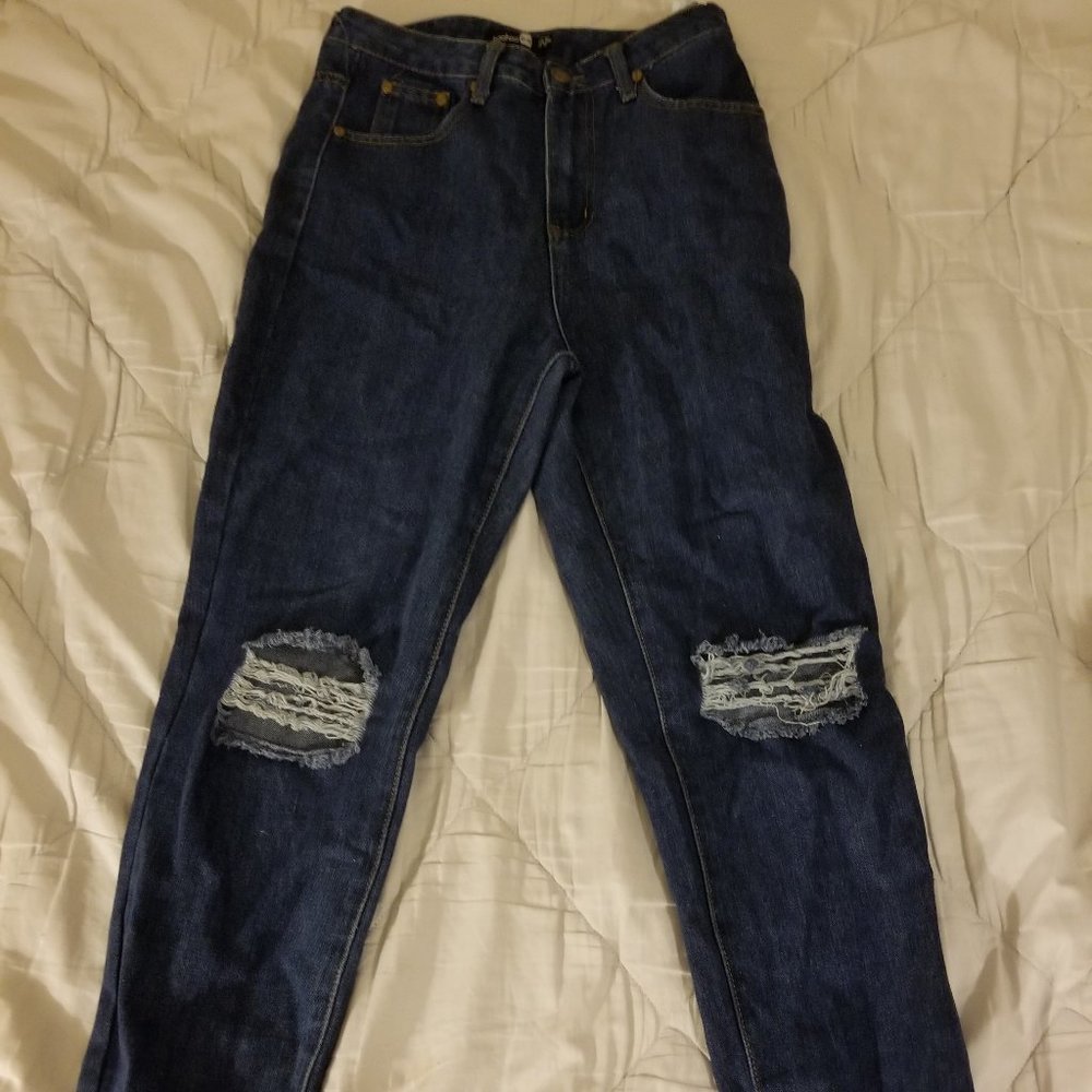 Women's boohoo ripped blue jeans